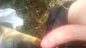 Guy aggressively thrusting into the mouth of an alluring fish outside