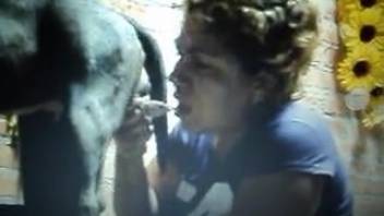 Girl with cropped hair deep throating a canine penis